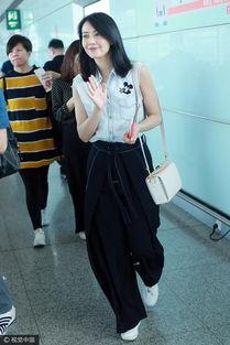 高圆圆机场照片,优雅女神魅力再现